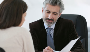 Lawyer Meeting with Client in Office